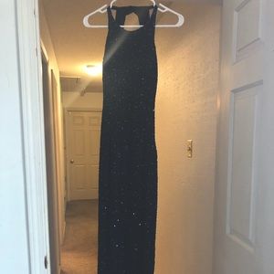 Beautiful Scala evening gown in dark teal. Just in time for the season!